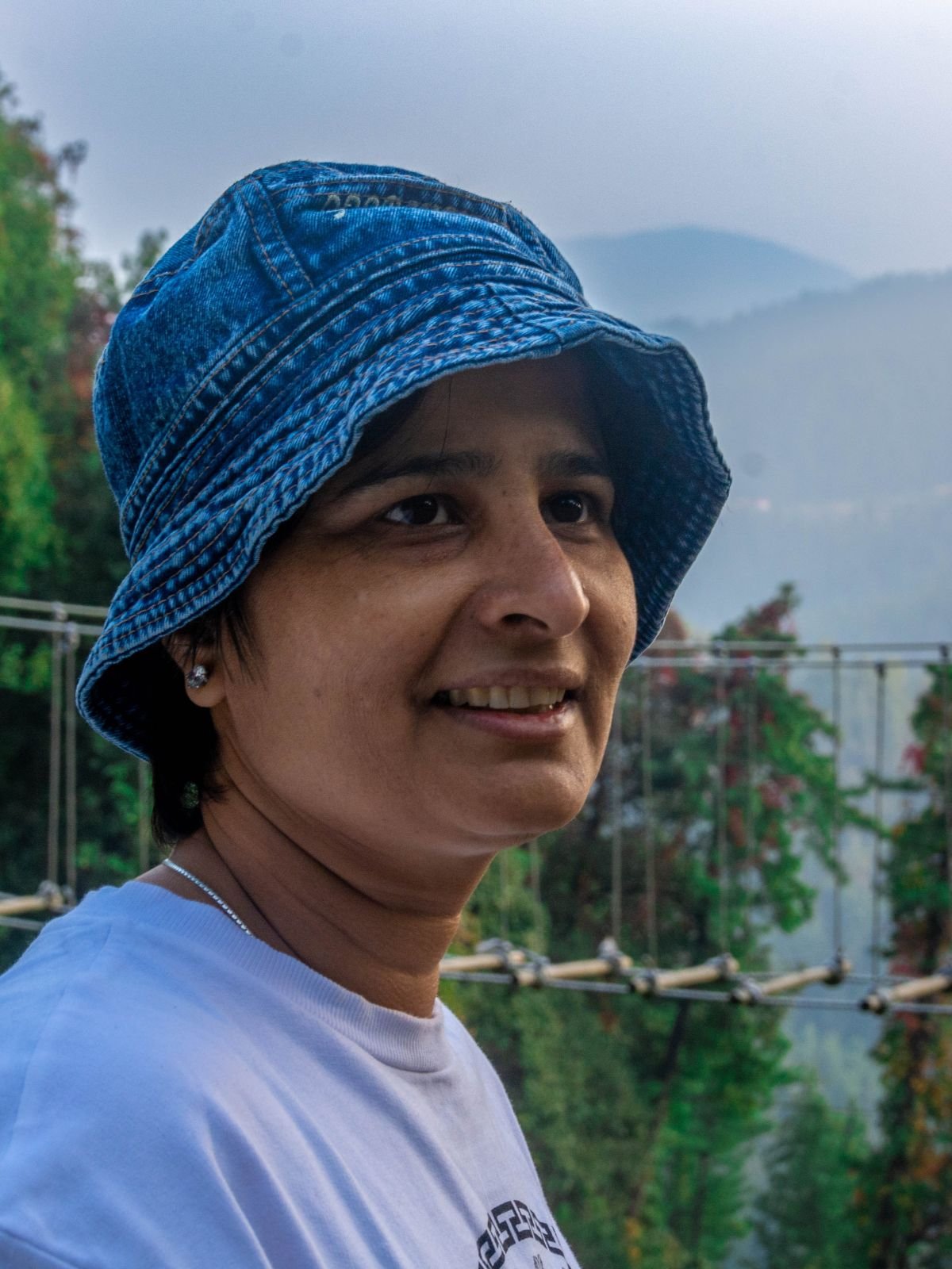 Monika Rana wearing a colourful Himachali cap