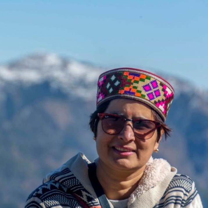 Monika Rana wearing a colourful Himachali cap